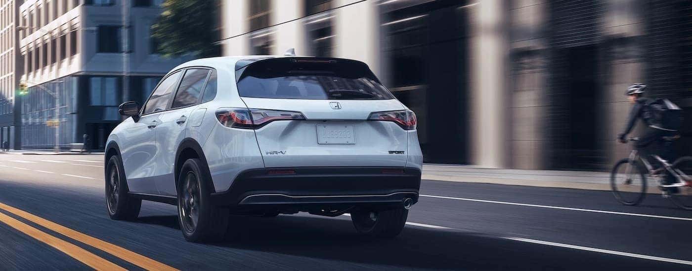 A white 2023 Honda HR-V from the rear at an angle.