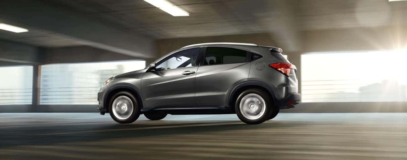 Grey 2016 Honda HR-V driving through a parking garage