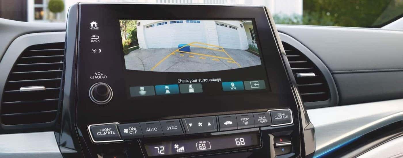 Infotainment display showing the back-up camera on a 2024 Honda Odyssey for sale near Rhome