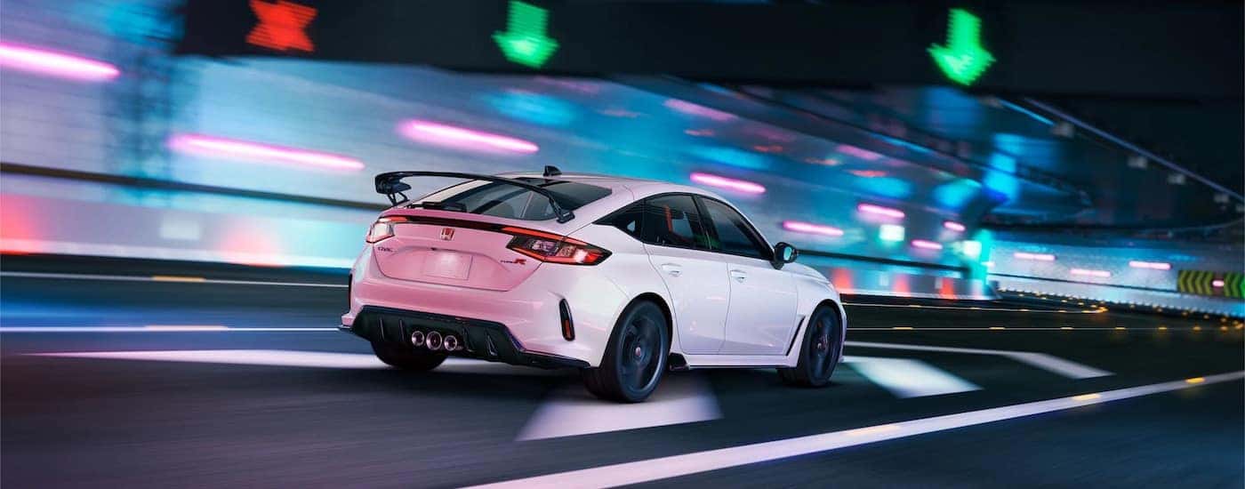 A white 2025 Honda Civic Type R from the rear at an angle.