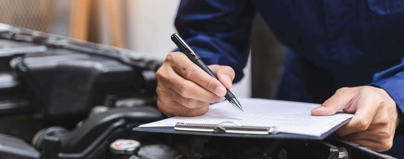 Technician holding a clipboard
