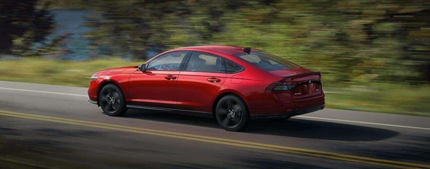 Rear of a red 2026 Honda Accord Hybrid.