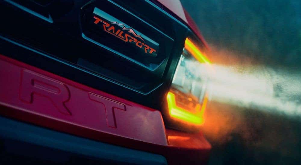 Headlight on a red 2026 Honda Passport TrailSport.
