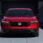 A red 2026 Honda Accord Sport-L Hybrid parked head-on.