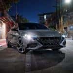 2022 hyundai elantra on display at night with headlights on