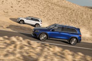 A pair of 2024 Mercedes-Benz GLB SUVs.