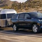 Chevy Suburban Towing a Trailer