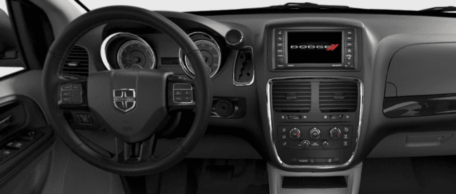 SE vs. SE Plus The dashboard of the Dodge Grand Caravan
