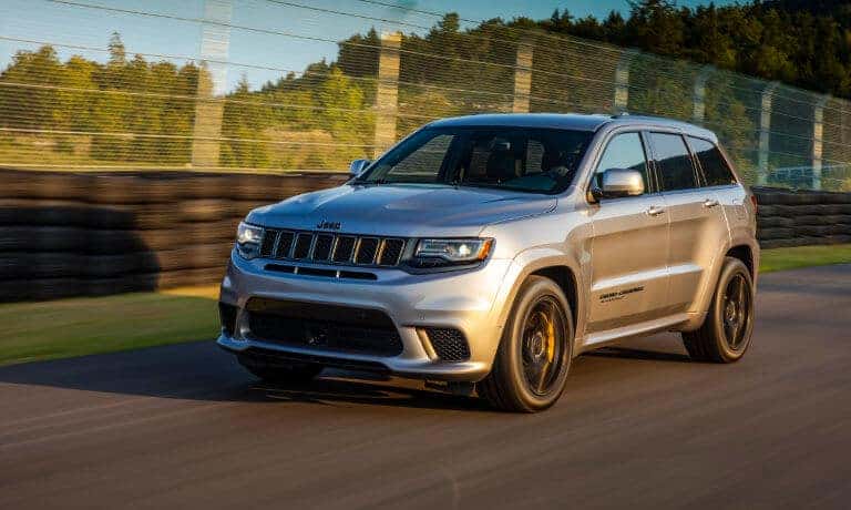 Silver 2019 Jeep Grand Cherokee on road