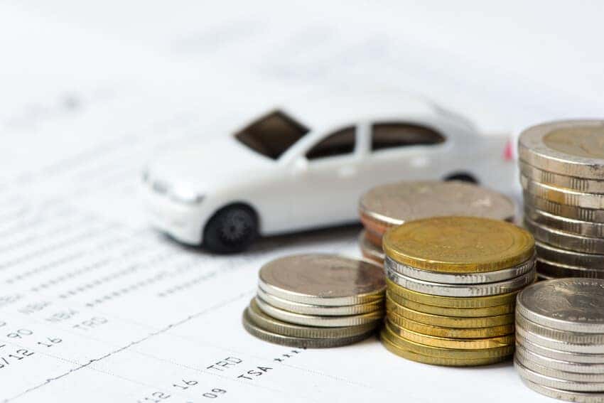 white car with coins