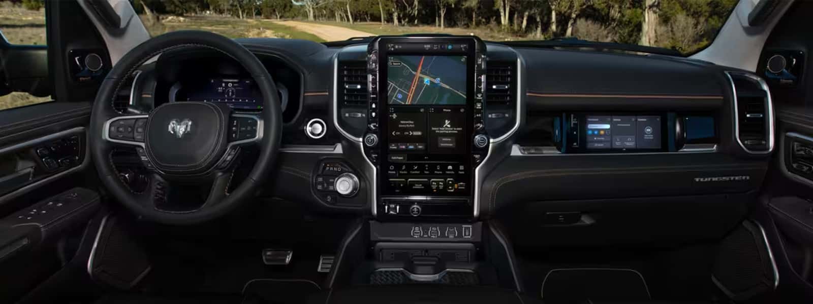 2025 Ram 1500 interior technology hero with Uconnect 5 screens