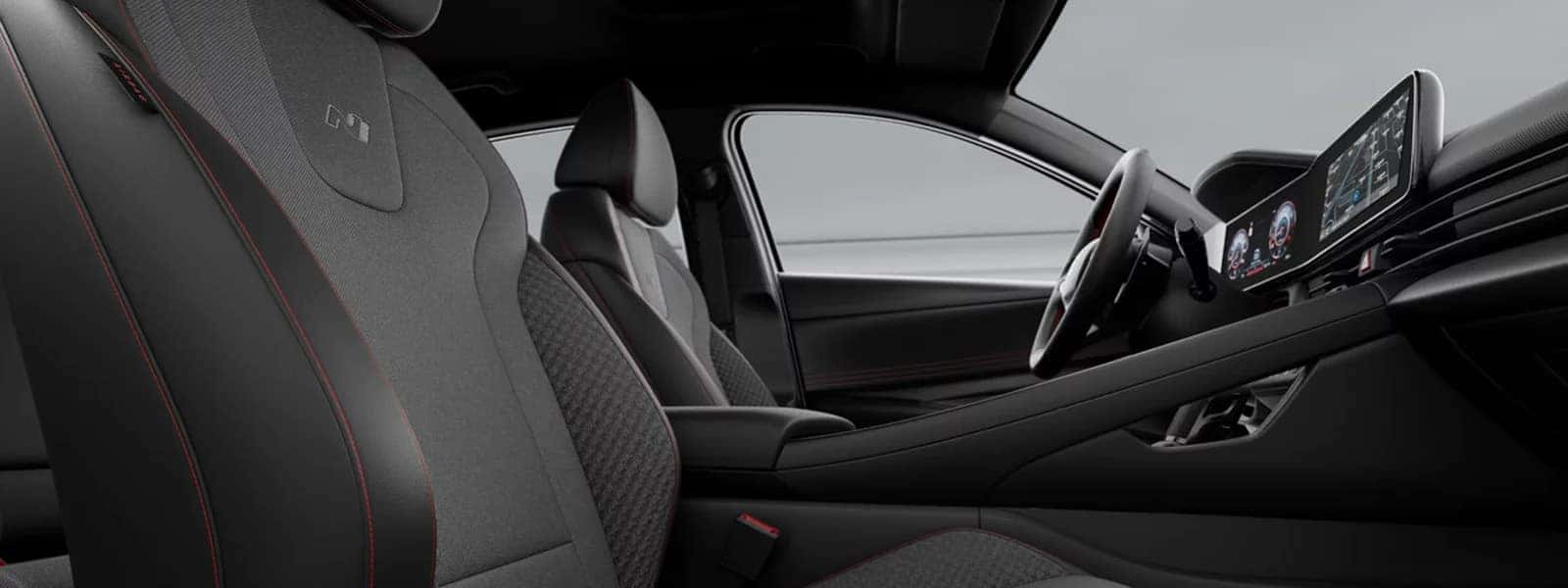 2025 Hyundai Elantra interior with panoramic displays and modern cockpit layout