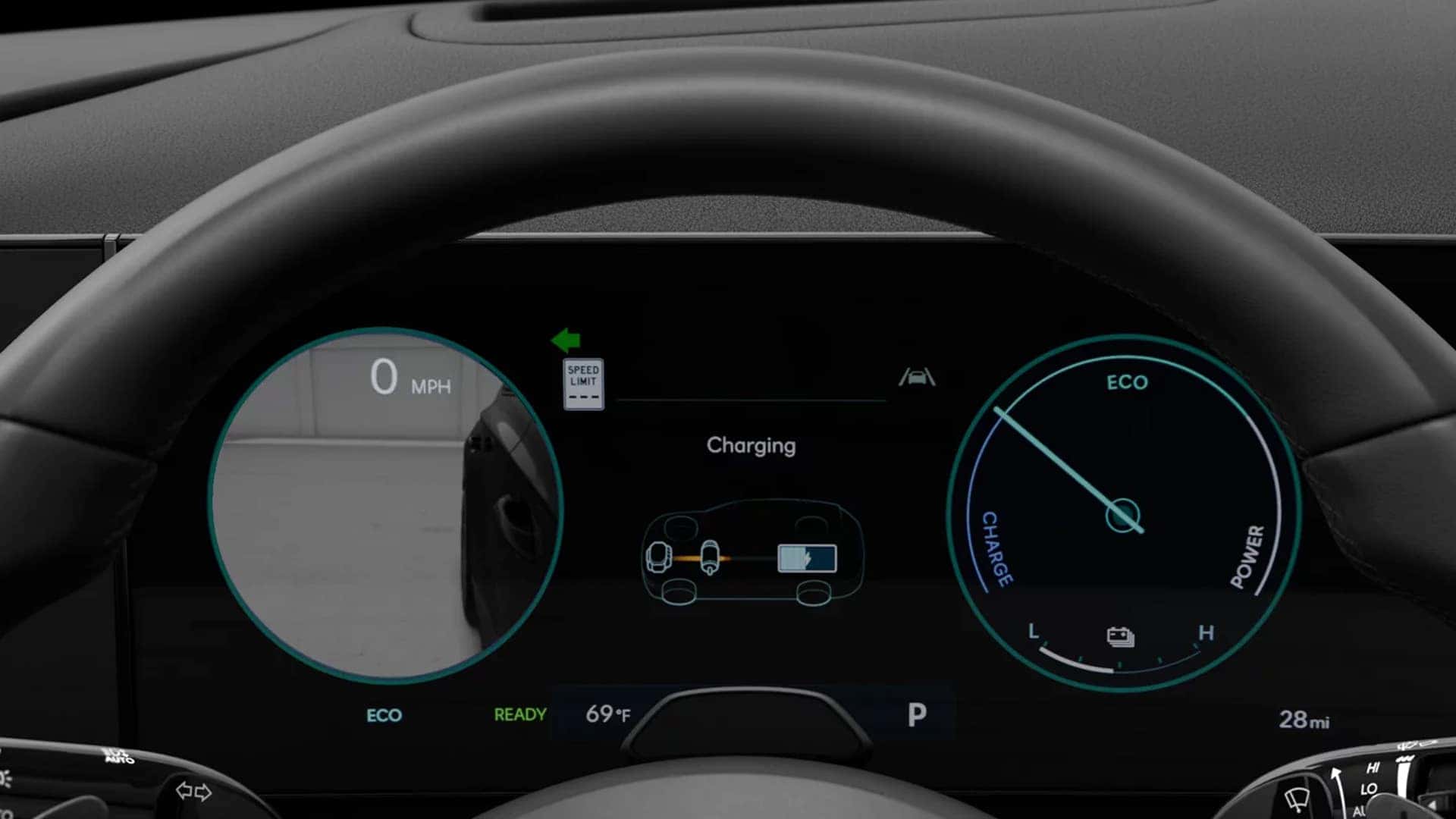 Digital instrument cluster in the Hyundai Tucson Hybrid showing hybrid system status, charging indicators, and eco driving information.