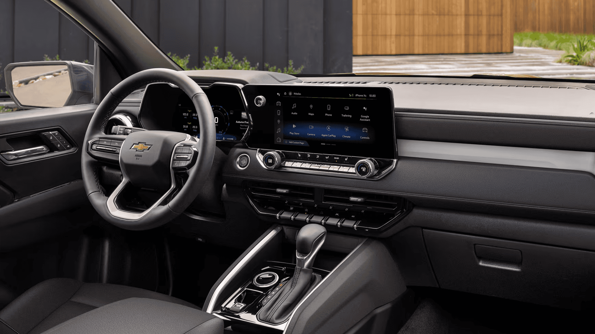 Chevy Colorado interior showing the dashboard, steering wheel, center console, and infotainment screen