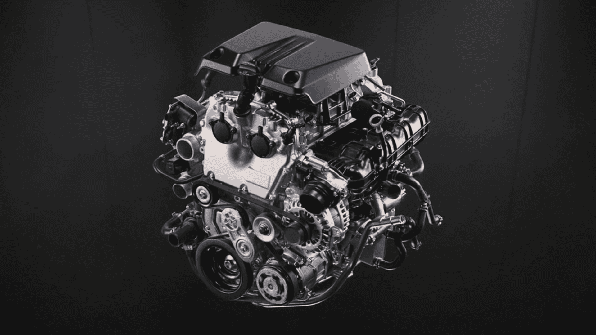 Chevy Colorado gasoline engine displayed outside the vehicle