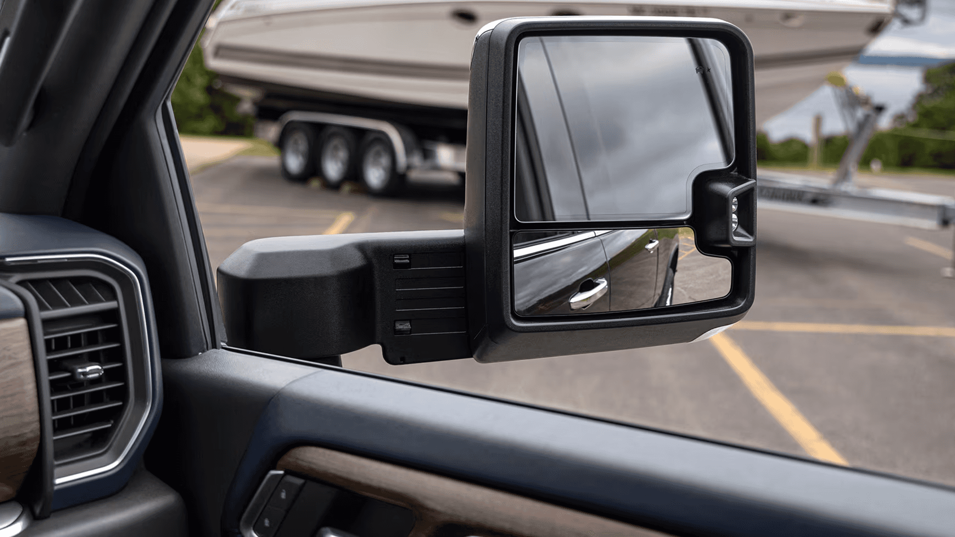 Passenger side trailering mirror on a 2026 Chevy Silverado HD extended outward