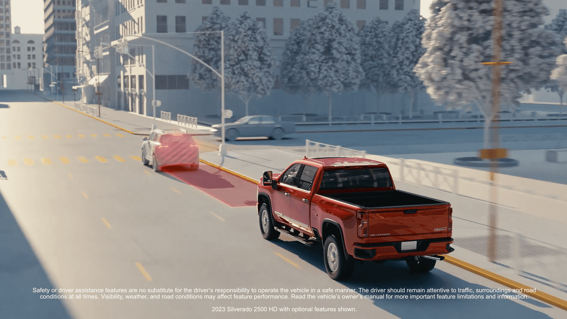 2026 Chevy Silverado HD using forward collision alert and driver assistance technology in city traffic