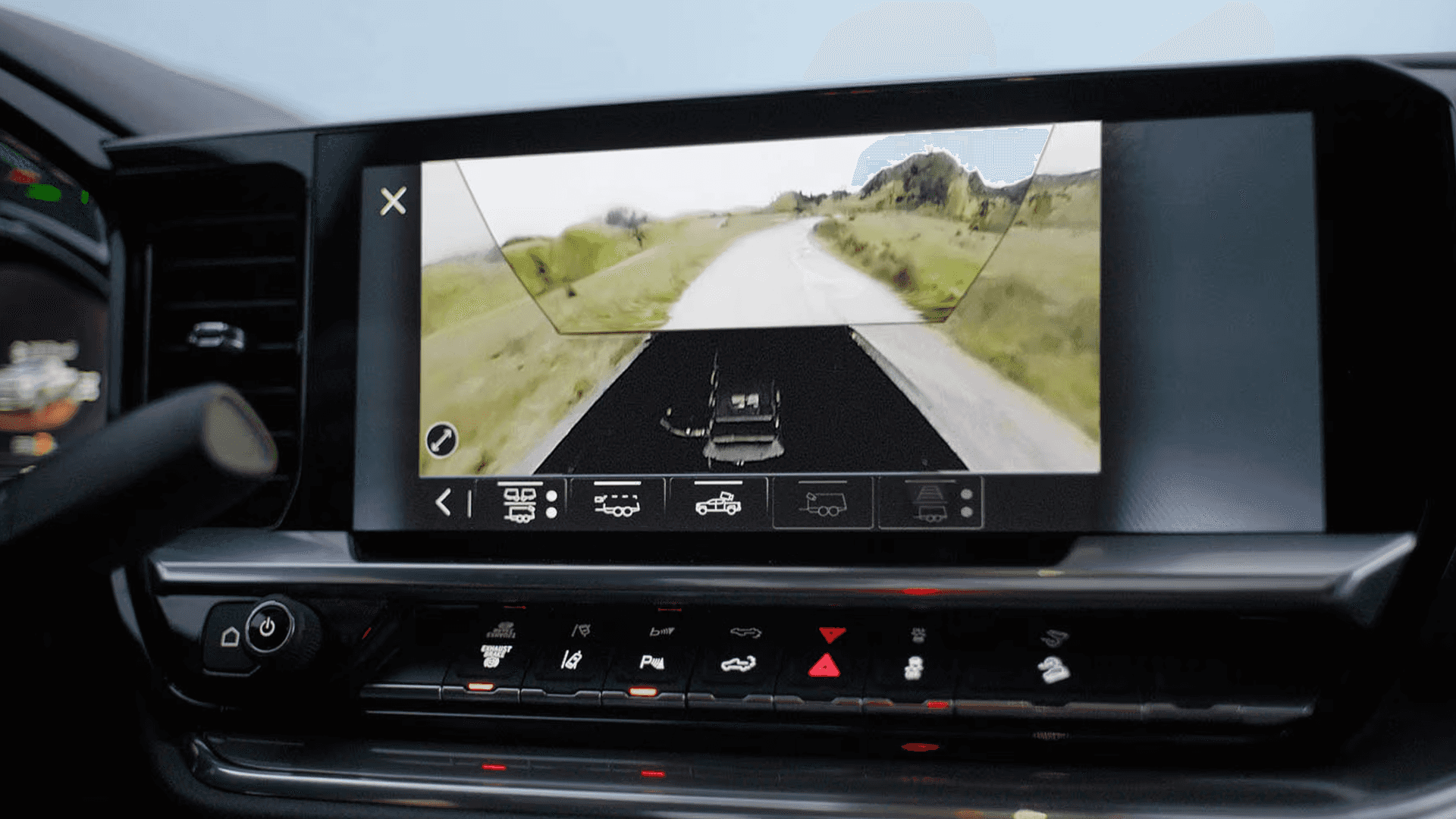 Silverado HD towing camera system showing rear trailer view on center touchscreen