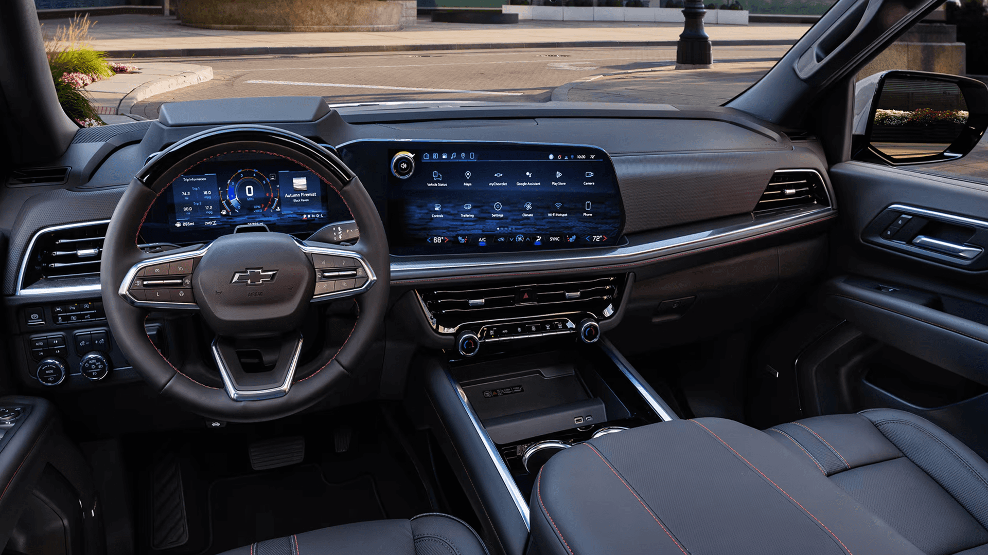 Interior cockpit of the 2026 Chevy Tahoe showing steering wheel, digital instrument cluster, and center touchscreen