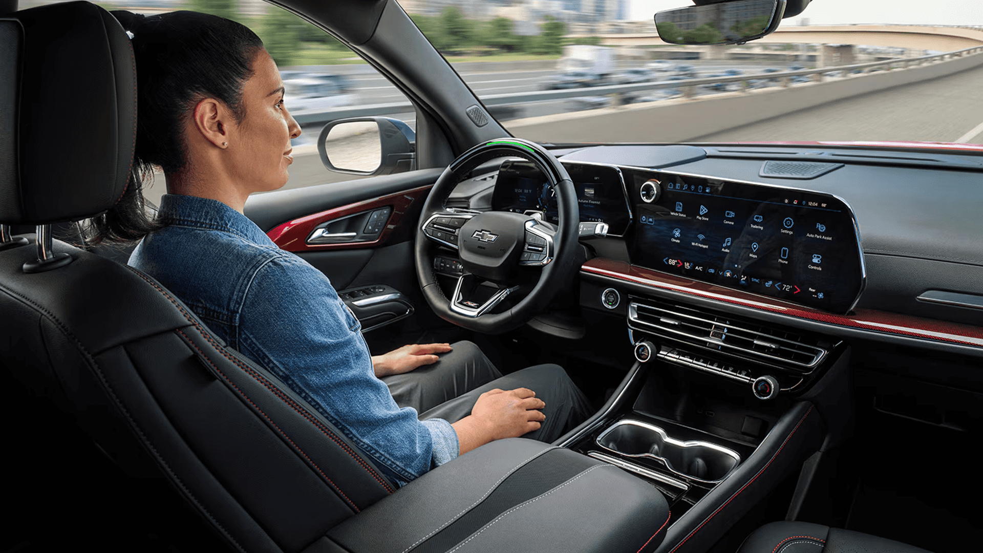 2026 Chevy Traverse front seats with driver using Super Cruise hands free feature