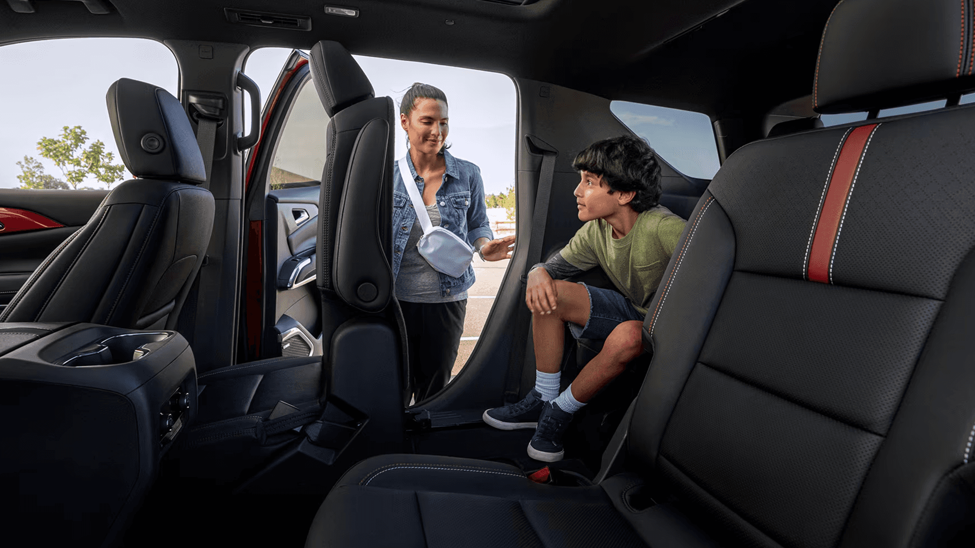 2026 Chevy Traverse interior seating showing three rows with passengers