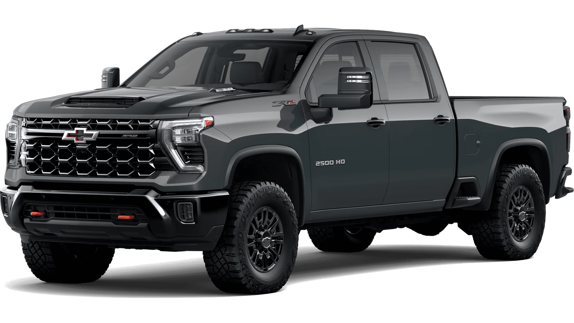 Studio image of an off road styled Silverado 2500 HD with black wheels, all terrain tires, black grille, and red tow hooks