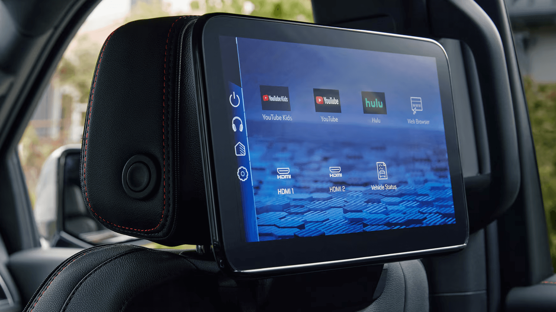 2026 Chevy Suburban rear seat entertainment system with dual headrest screens streaming YouTube and Hulu