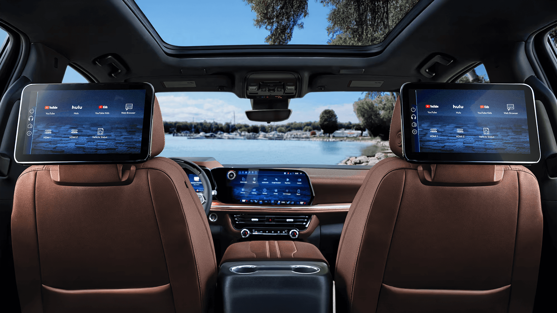 2026 Chevy Suburban infotainment system showing navigation, Google built in apps, and climate controls on widescreen display