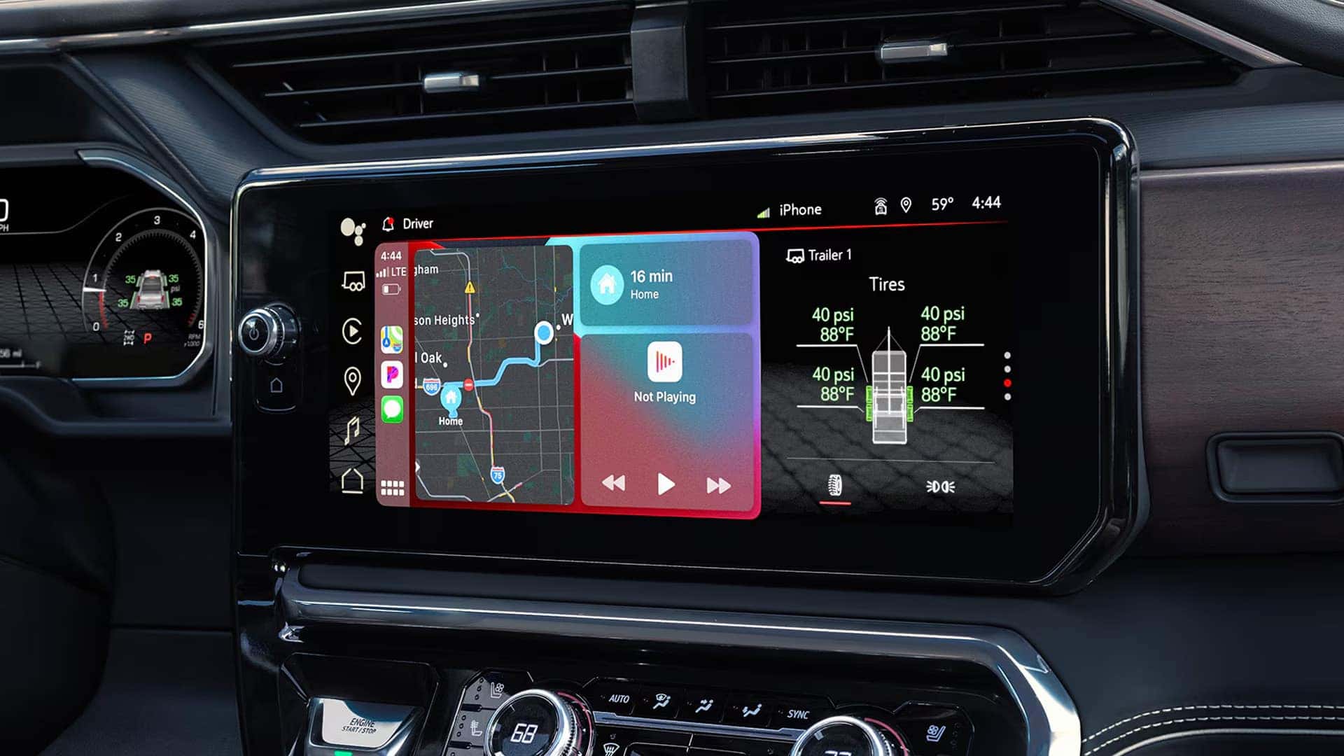 Center touchscreen in the 2026 GMC Sierra 1500 showing navigation, smartphone integration, media controls, and trailering information.