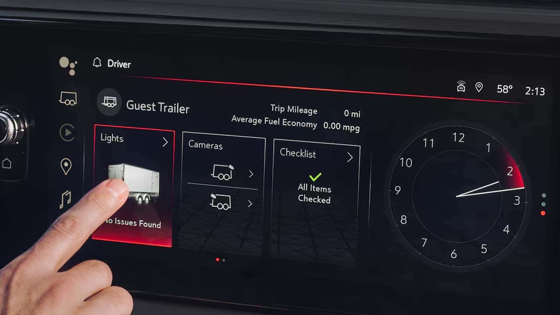 Close-up of the Sierra 1500 infotainment screen showing trailering features like trailer lights, camera views, and a pre-tow checklist.