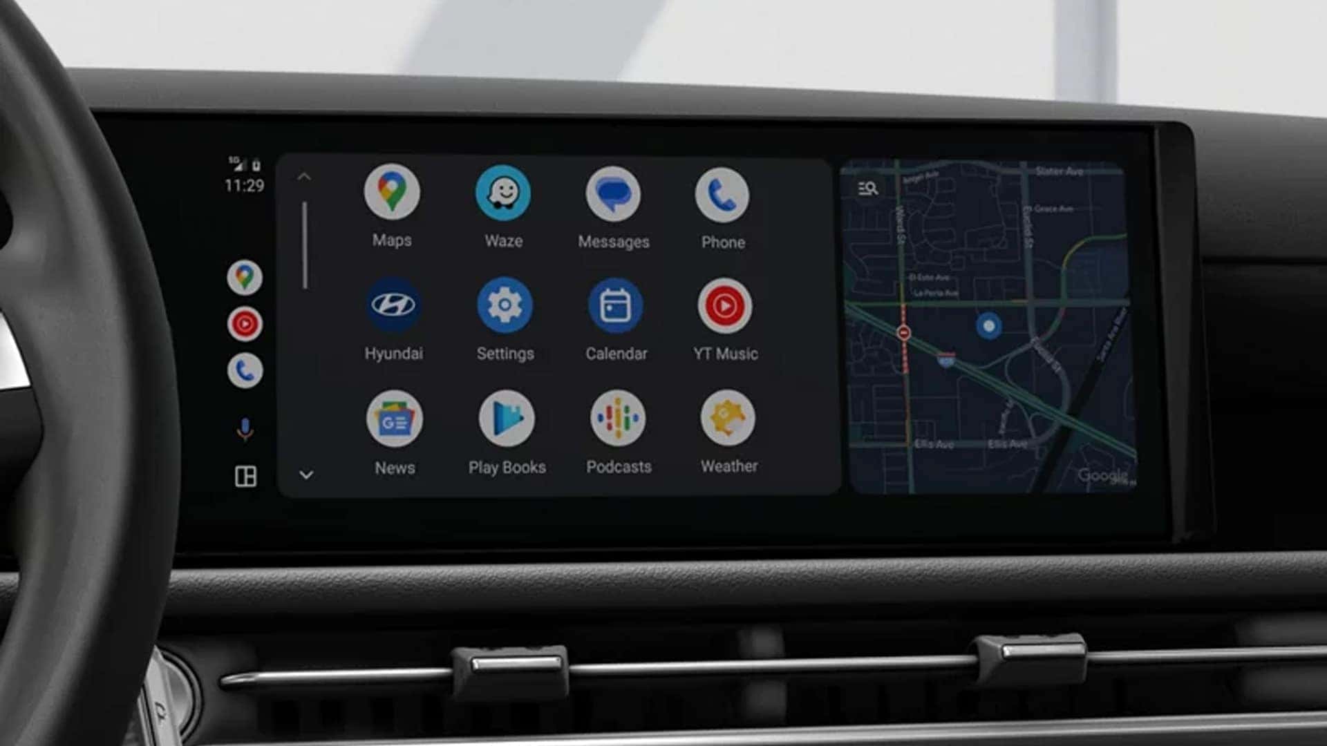 Wide touchscreen display in the Hyundai Tucson Hybrid showing navigation, smartphone integration, and infotainment apps.