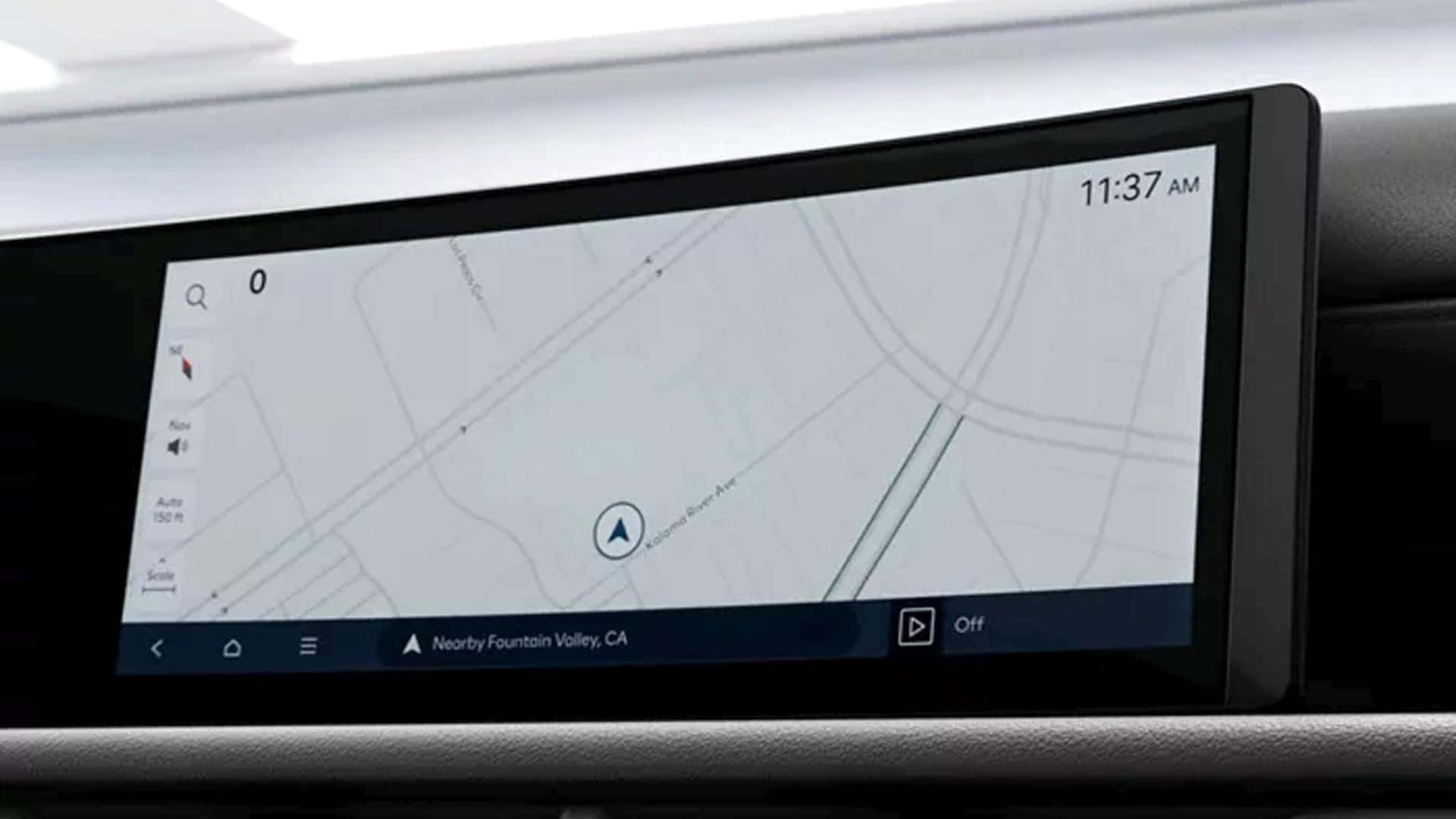 Close-up of the Hyundai Tucson Hybrid touchscreen displaying built-in navigation with map and route guidance.