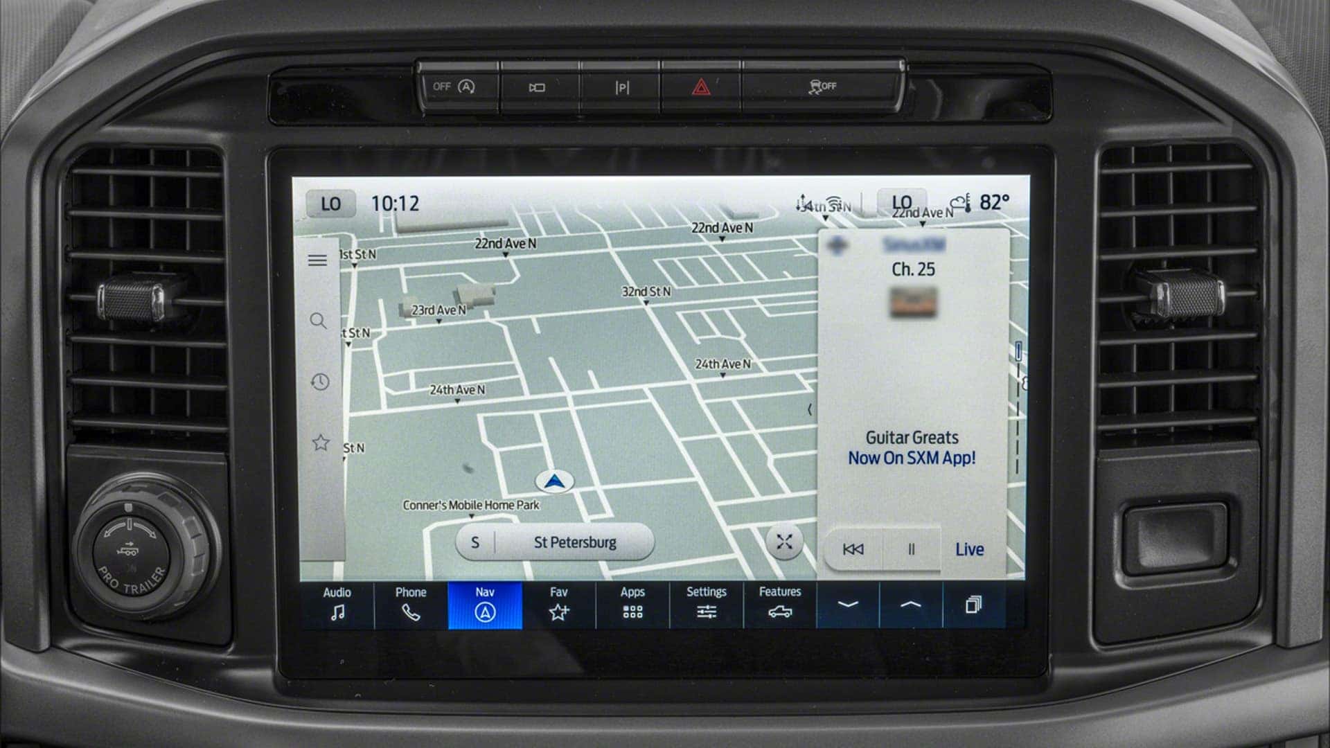 Interior of the 2026 Ford F-150 showing the center console, touchscreen infotainment system, and cabin layout designed for audio and device connectivity