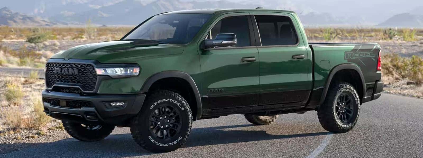 2026 Ram 1500 pickup truck shown from the front three-quarter angle on an open road