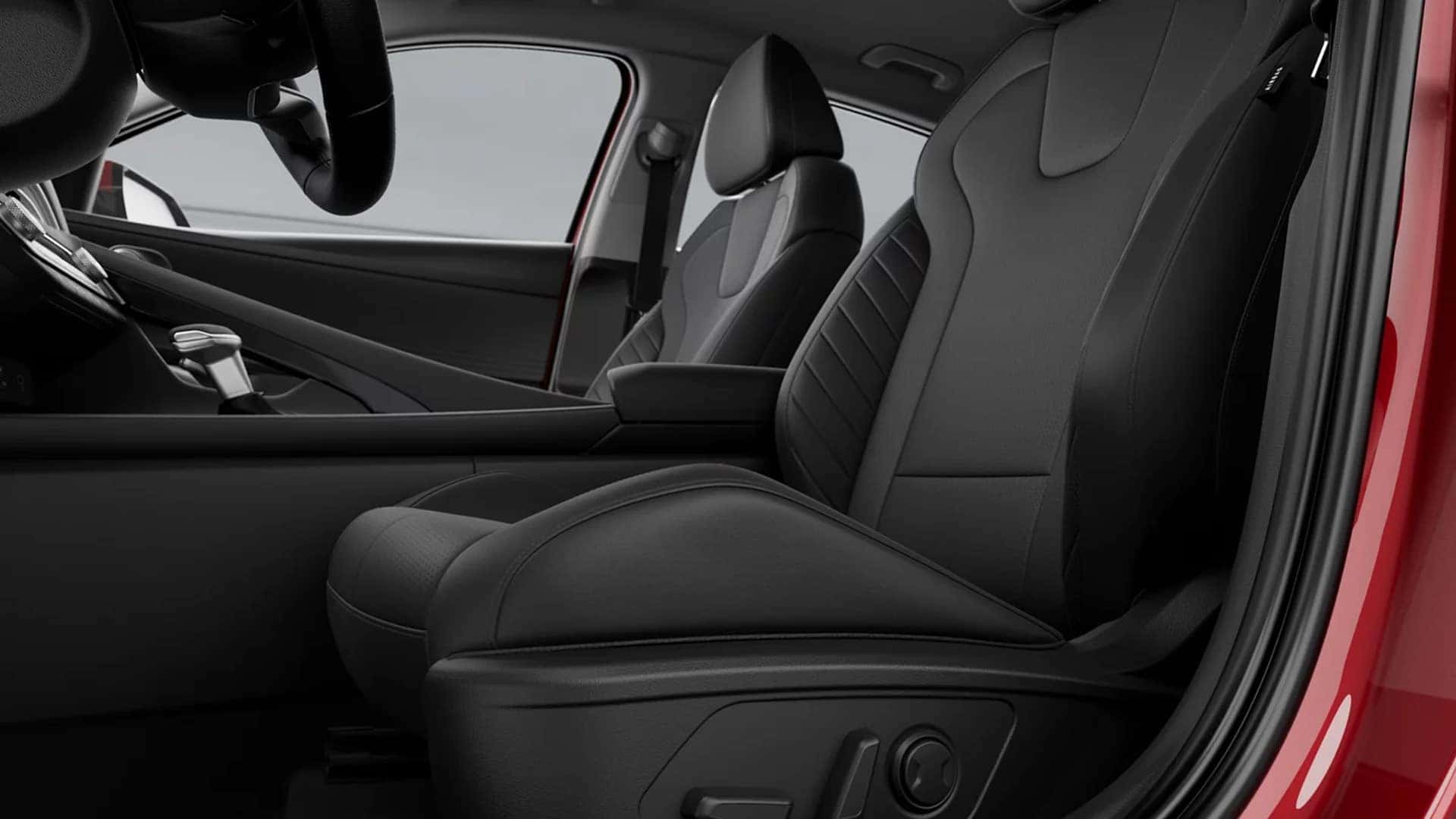 2026 Hyundai Elantra interior design featuring a driver focused dashboard, cloth front seats, and angled center console layout
