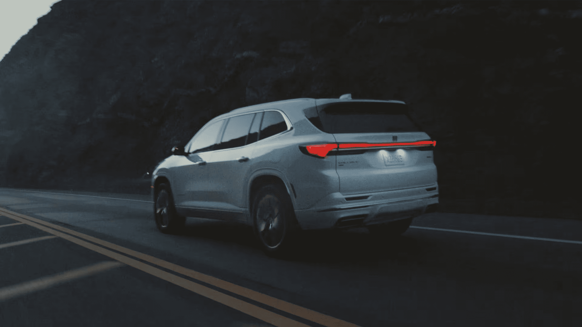 2026 Buick Enclave parked under a bridge showing full exterior design and stance