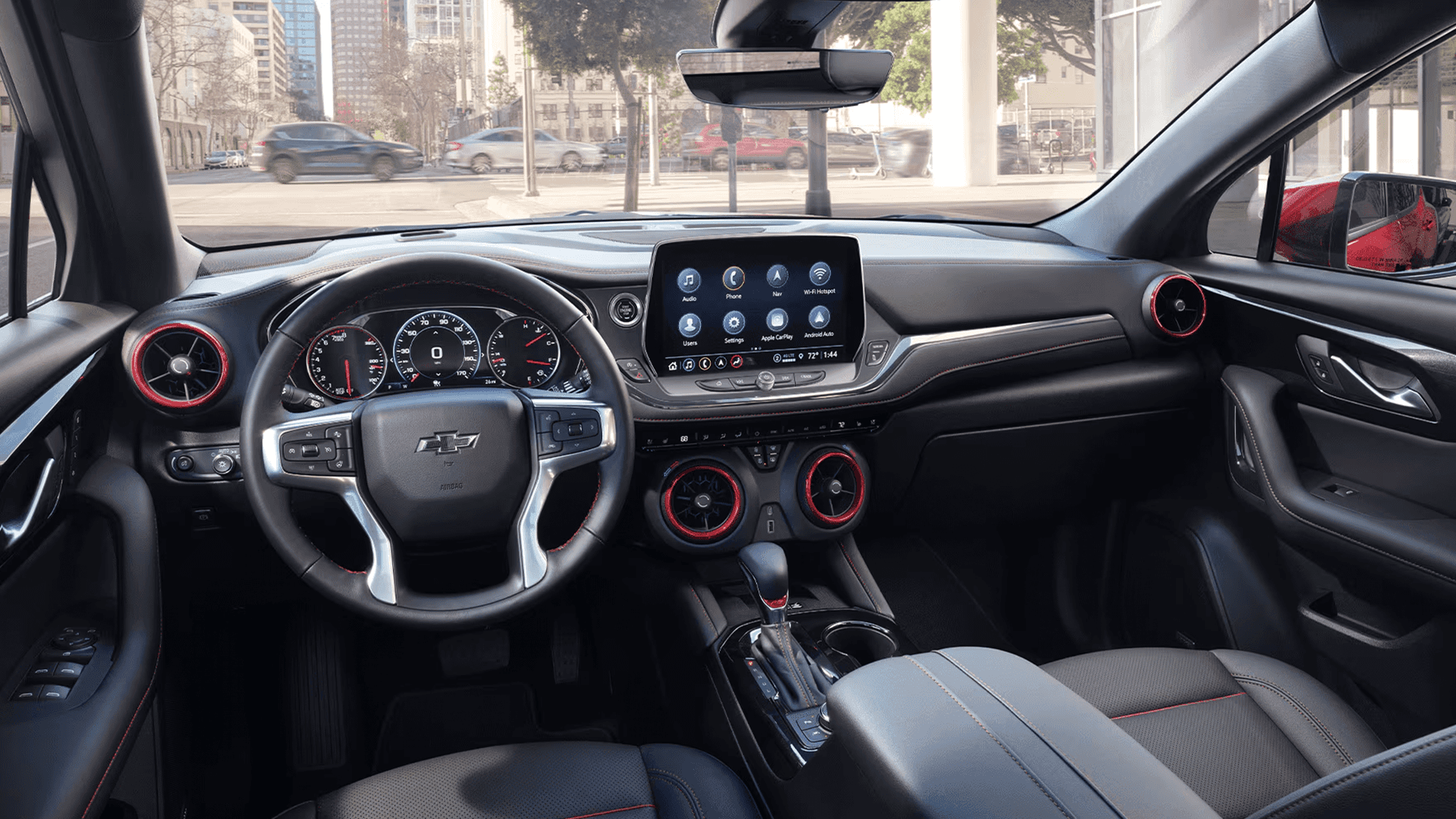 2026 Chevy Blazer interior cockpit view with steering wheel, gauges, and center touchscreen