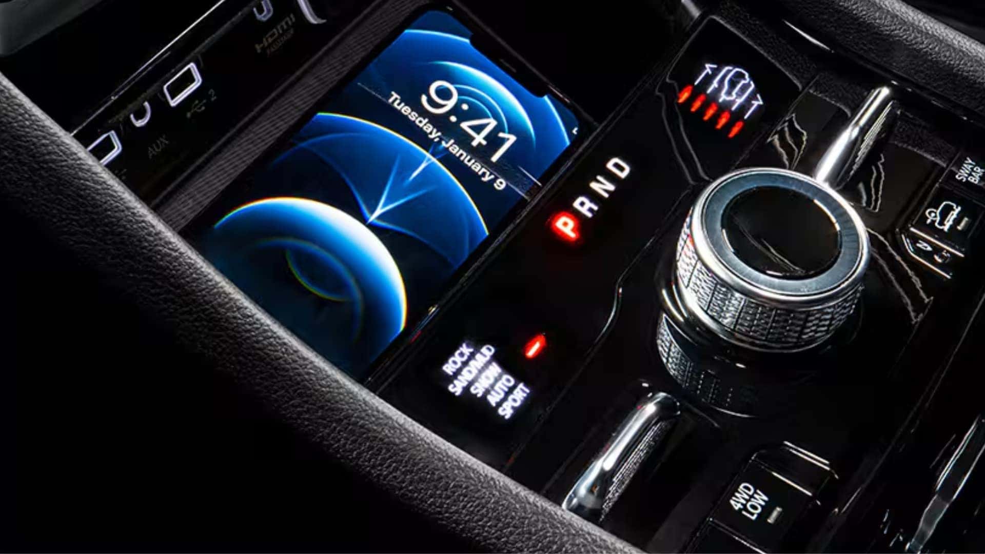 2026 Jeep Grand Cherokee wireless charging pad and center console connectivity features