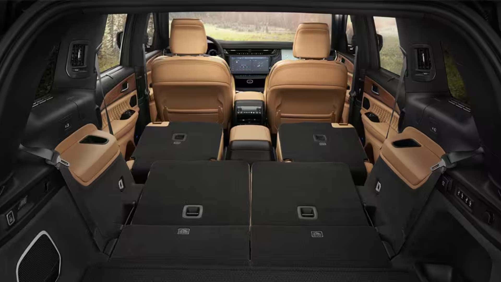 2026 Jeep Grand Cherokee cargo area with seats folded down for storage