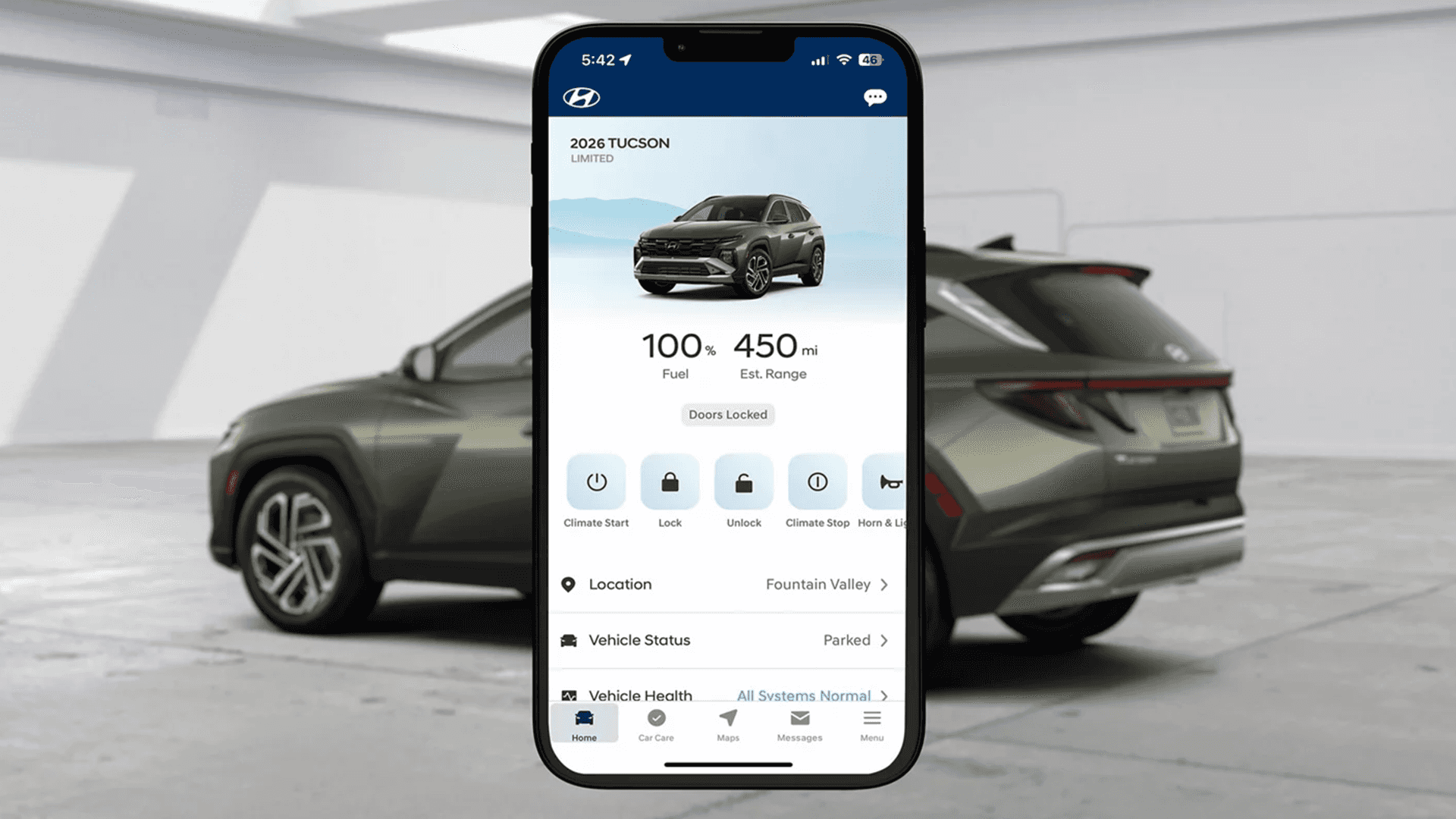 Smartphone screen showing the Hyundai app for a 2026 Tucson with fuel level and estimated range plus remote controls for climate start, lock, unlock, and horn, over a blurred green Tucson in a studio setting.