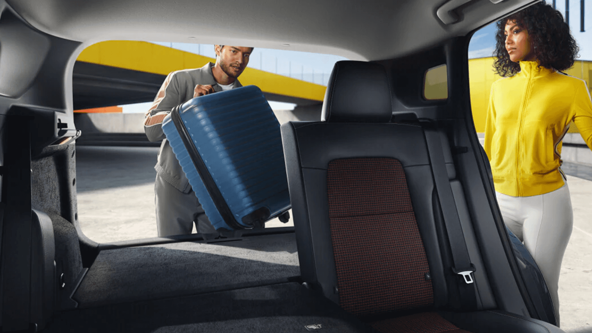 Rear cargo area of the 2026 Nissan Kicks with folding rear seats