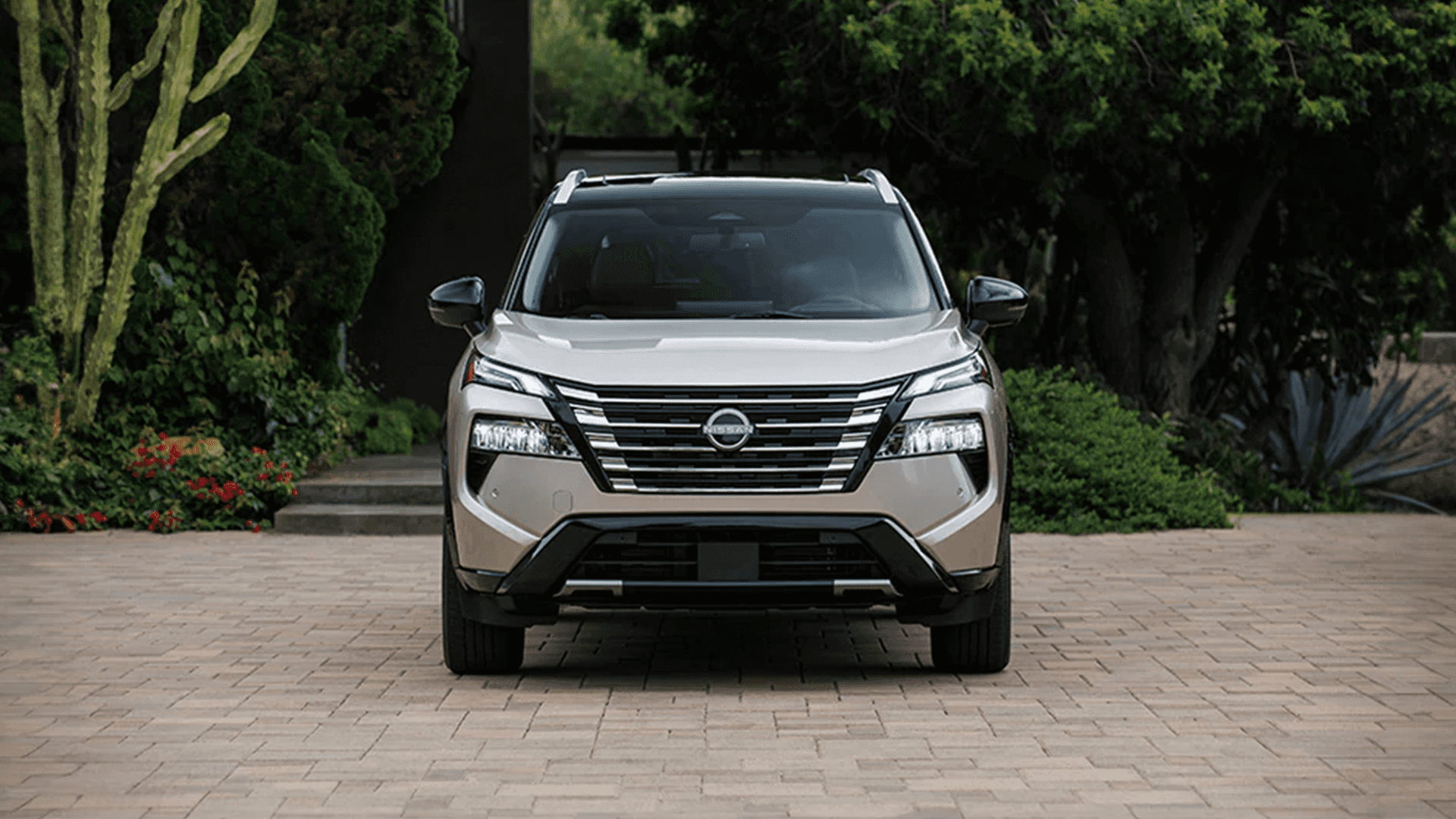 Front view of the 2026 Nissan Rogue showing LED headlights and signature lighting