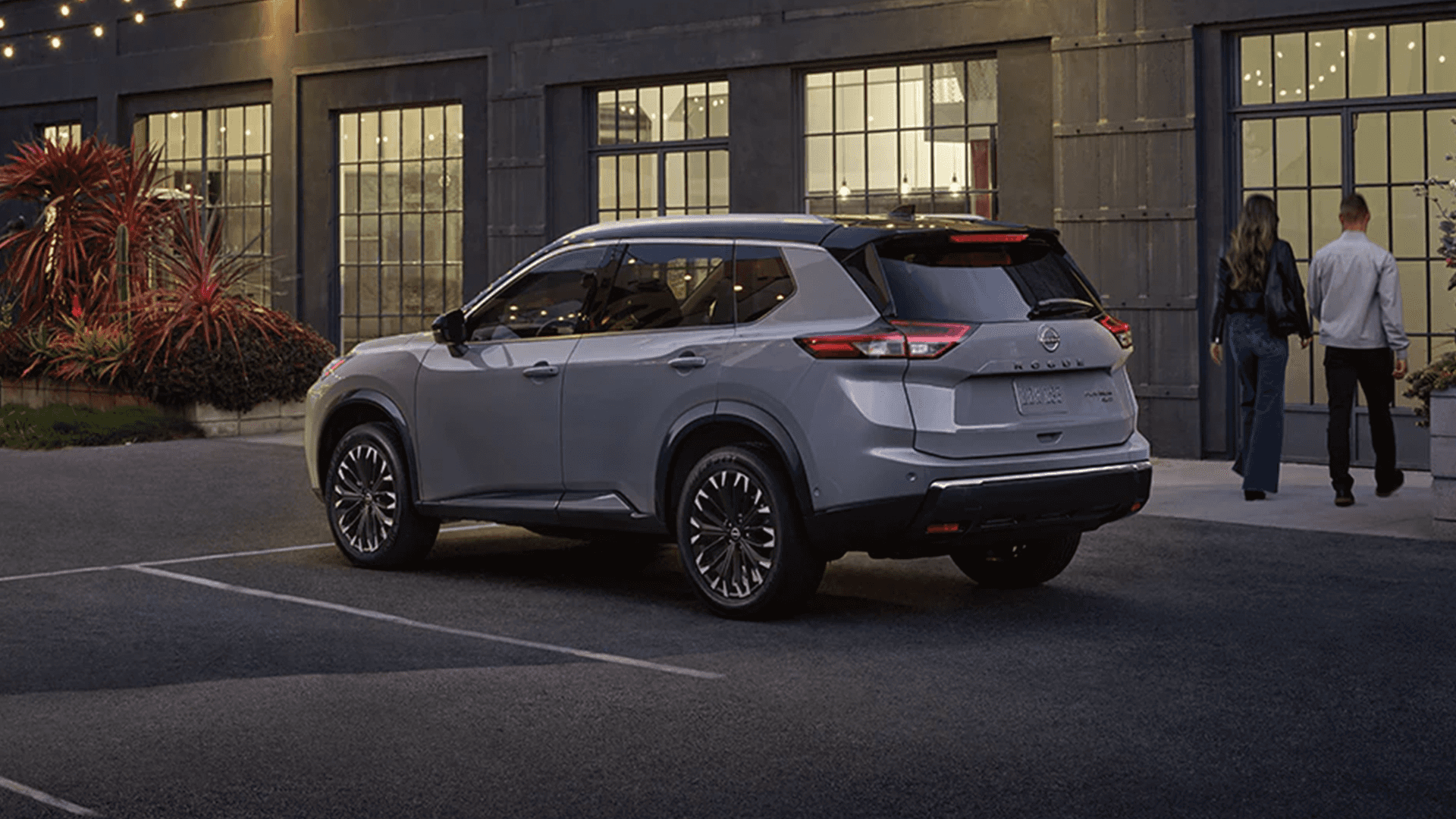 Rear three quarter view of the 2026 Nissan Rogue highlighting wheel design and exterior profile