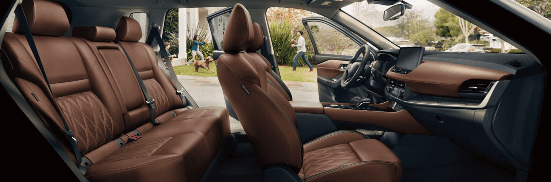 2026 Nissan Rogue interior view showing cockpit, dash, and front seating area