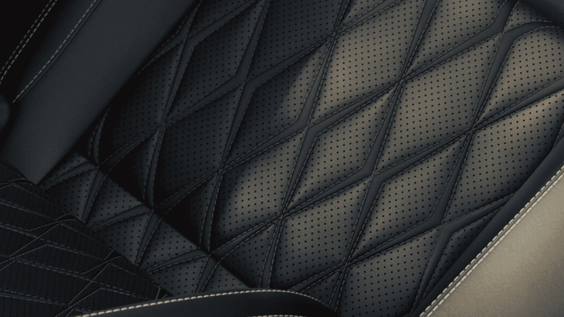 Close-up of 2026 Nissan Rogue perforated leather seat with quilted stitching pattern