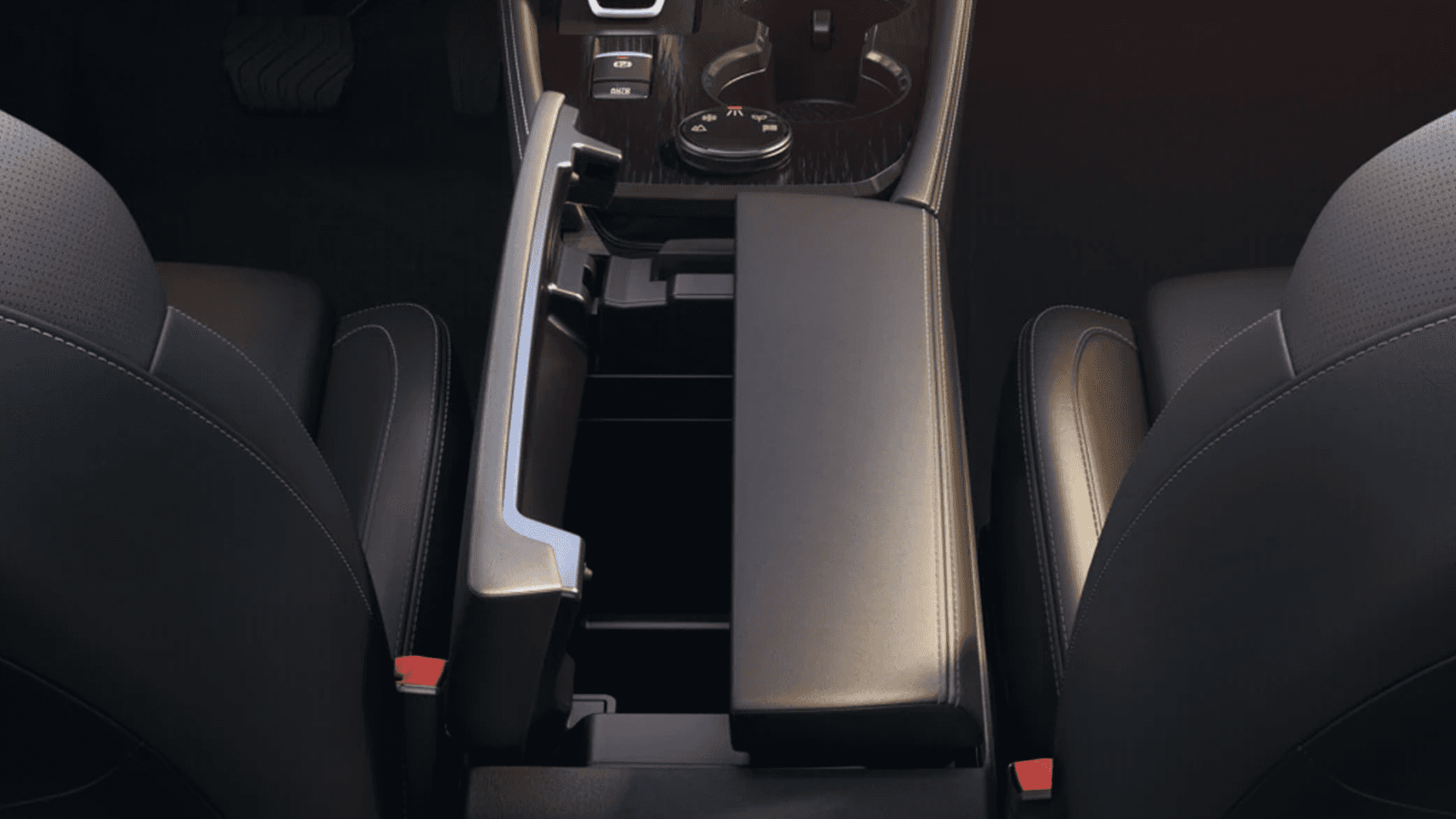 2026 Nissan Rogue center console storage compartment with armrest lifted open