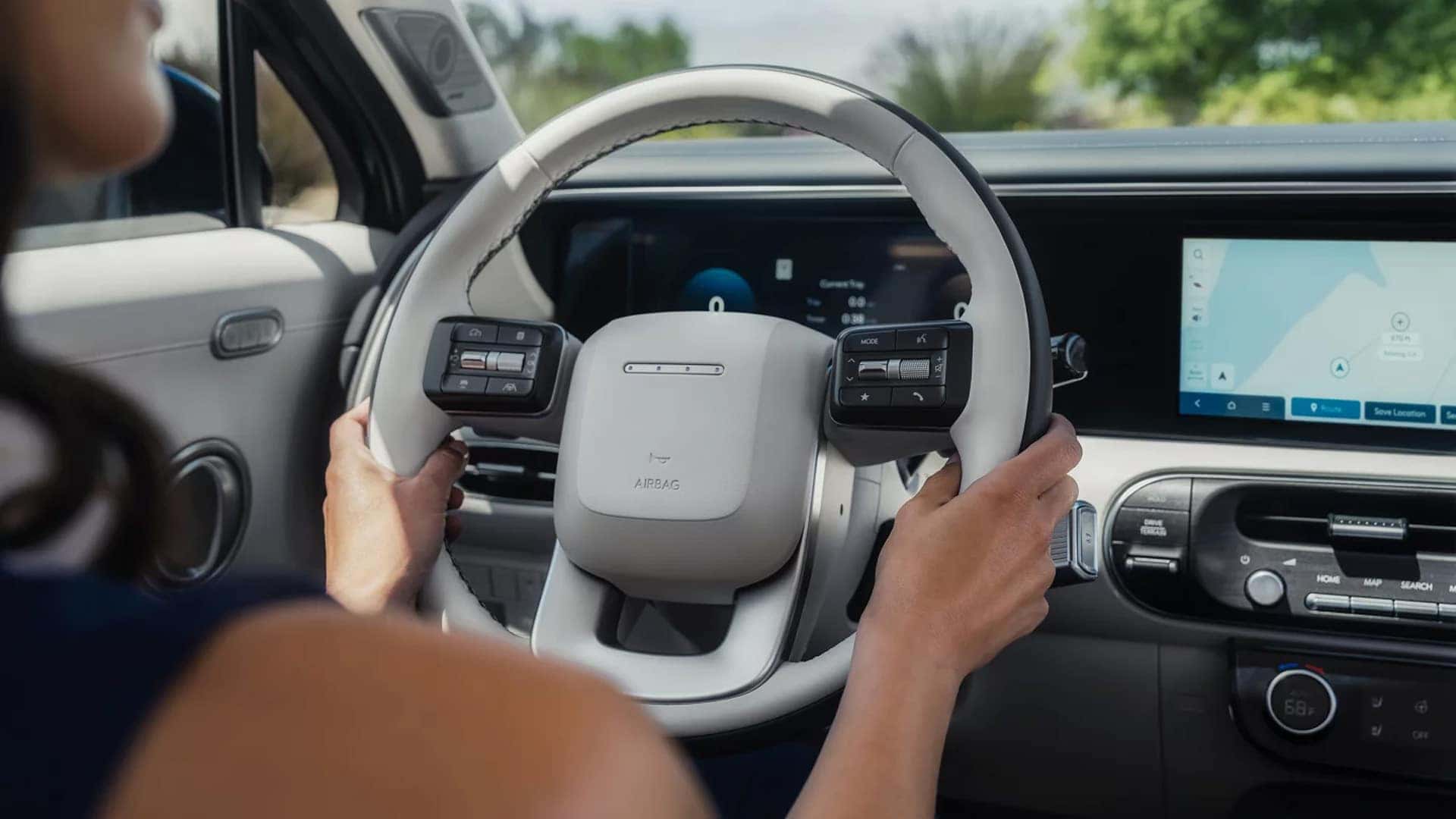 Digital instrument cluster in the 2026 Hyundai Palisade Hybrid displaying lane guidance, speed, and driver assistance features