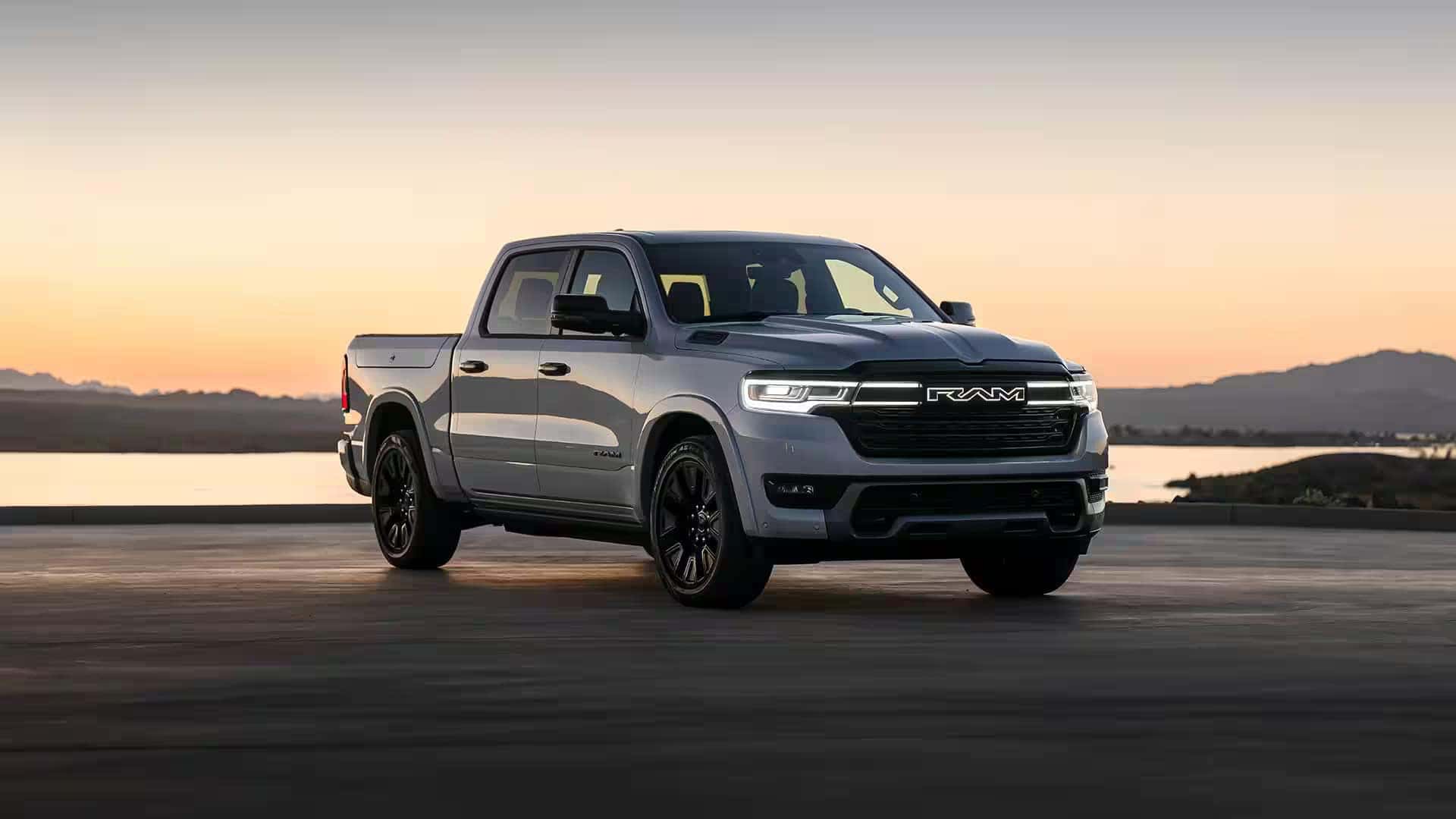 2026 Ram 1500 exterior appearance shown in gray with black wheels, aggressive stance, and premium styling elements