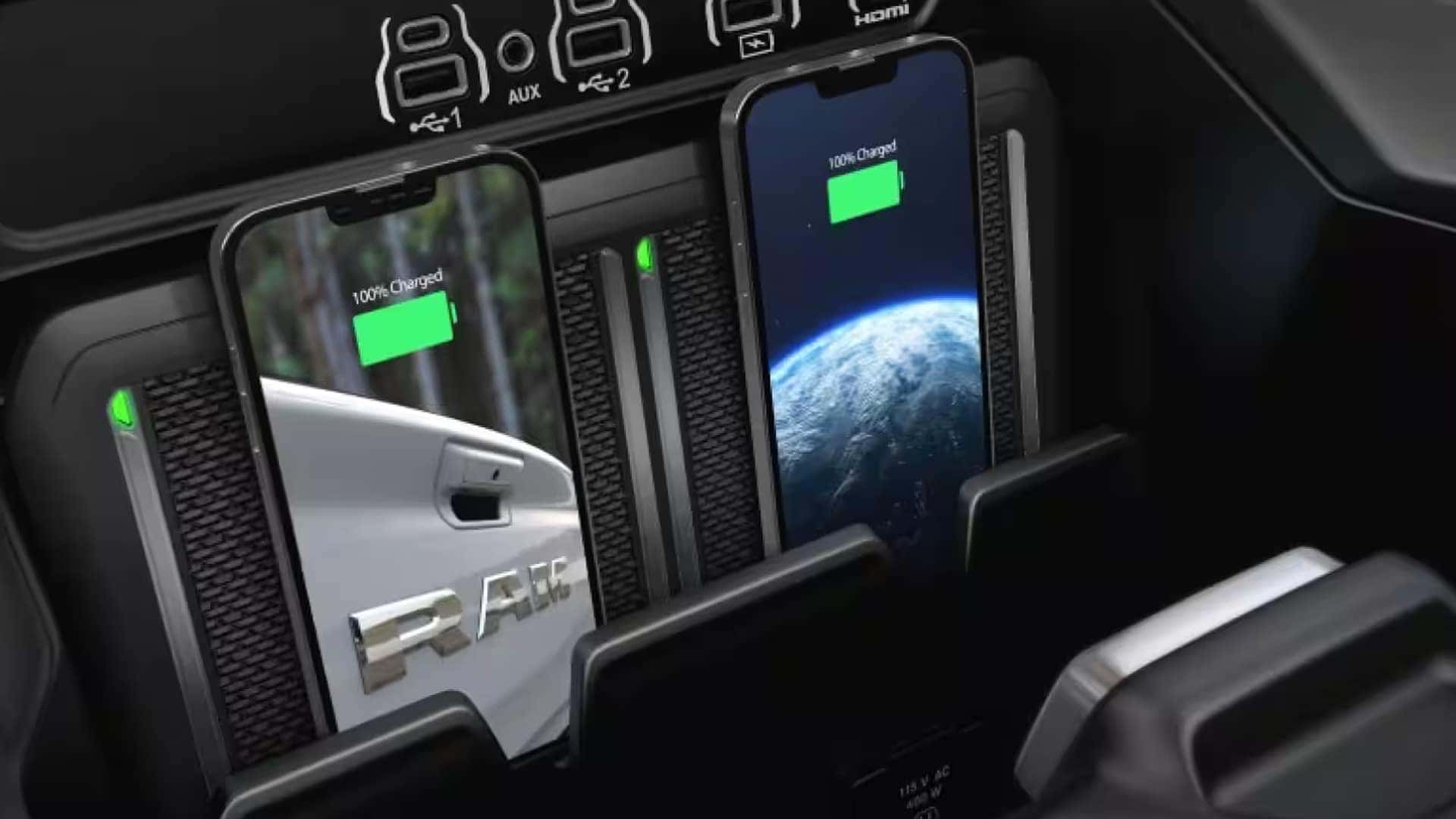 Dual wireless charging pads in the 2026 Ram 1500 center console charging two smartphones at the same time