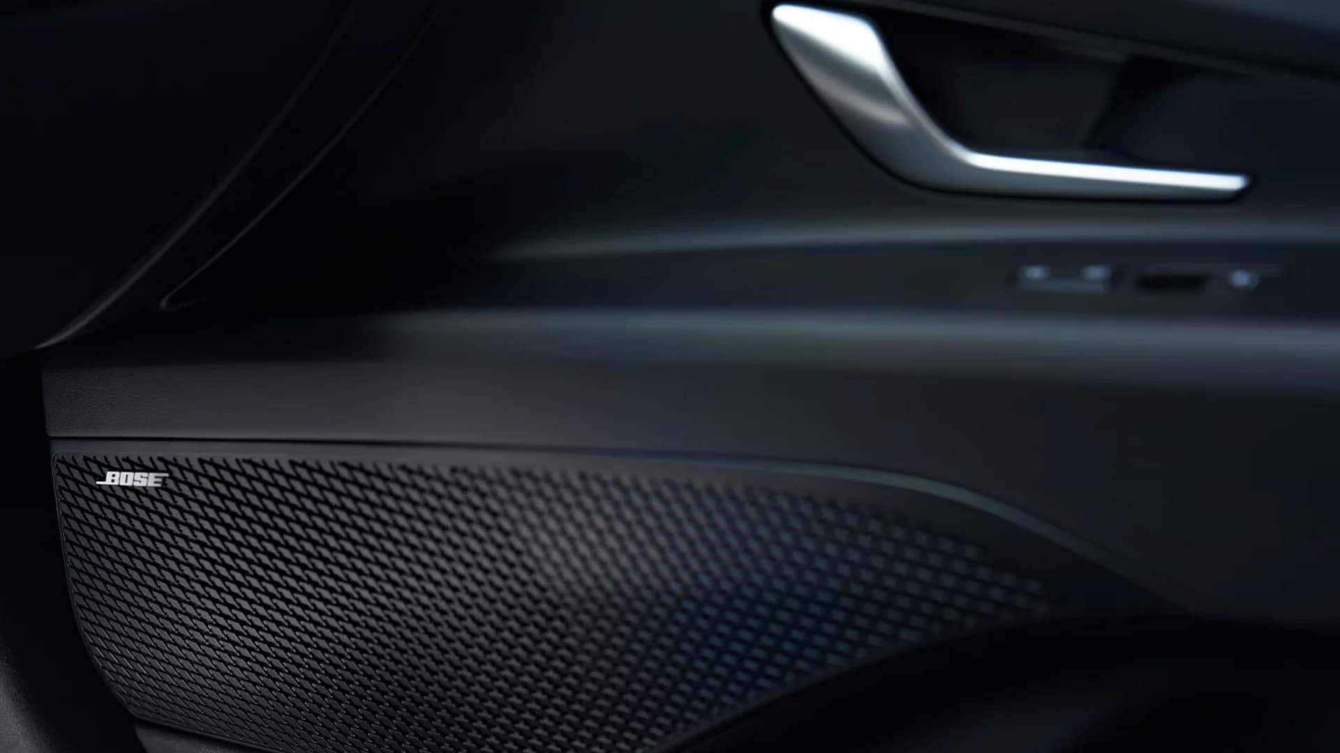 Bose branded interior door speaker grille inside the 2026 Hyundai Elantra showing premium audio system detail